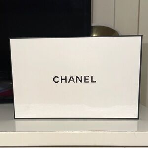 CHANEL Elegant White Box with Black Accents.03/12/2026